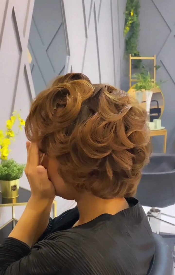 Curled bridal updo by Efrez
